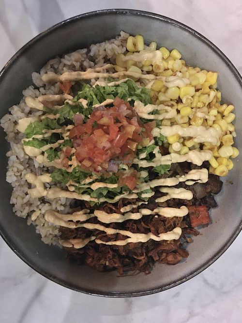 Fiesta bowl (jackfruit carnitas, corn, Cuban beans, pico de gallo and chipotle cream on brown rice)  at Ver De in El Nido