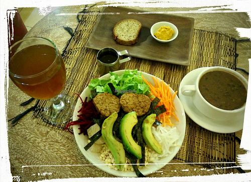 Dragon salad with sprouted sourdough bread (and pumpkin butter) and Mexican black bean soup. at Earth Cafe and Market in Ubud