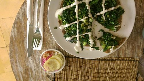 raw vegan pizza  at Earth Cafe and Market in Ubud