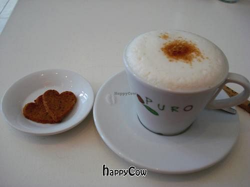 Soy cappuccino with vegan cookies. at Fine Fresh Food in The Hague