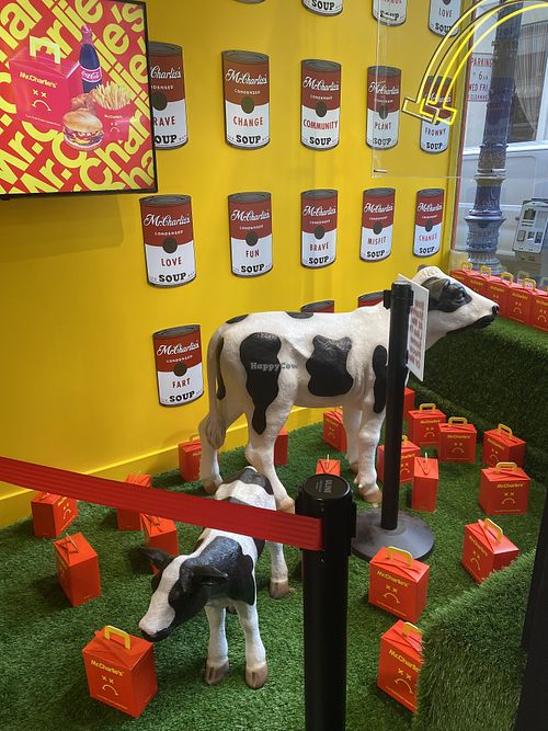 Cow Decor in Interior on Faux Grass  at Mr.Charlie's - San Francisco in San Francisco