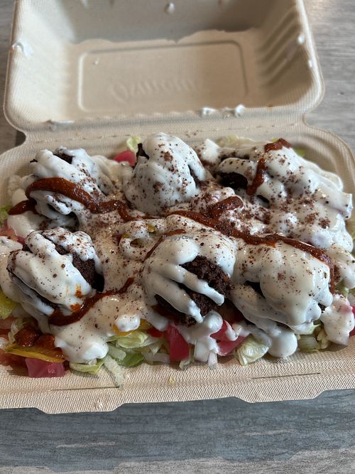 Falafel on the rocks with vegan garlic sauce!   at Osmow's in Kingston