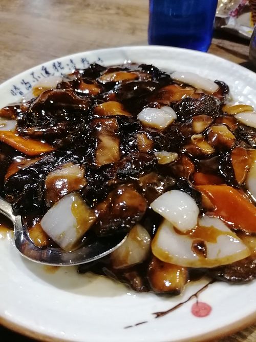 Shiitake, onion and carrot in teriyaki sauce at Higuma in Platja Daro