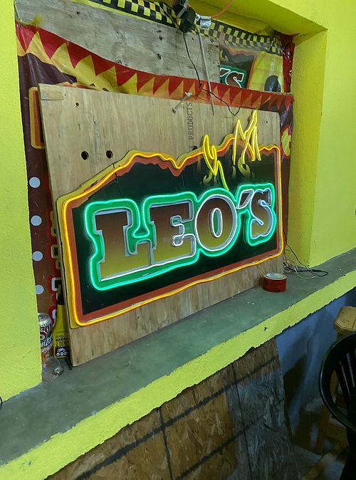 Leo's logo on the restaurant interior at Leo's Tacos Grill in Hidalgo