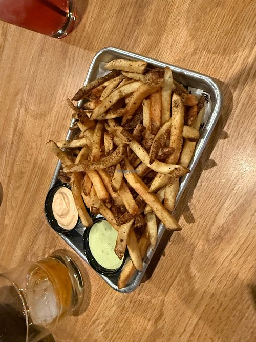 More fries and vegan sauces! at The Tiny Pony Tavern in Yucca Valley