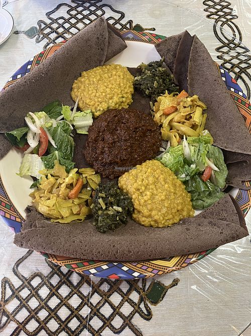 Vegan platter with gluten-free injera  at Enat in London