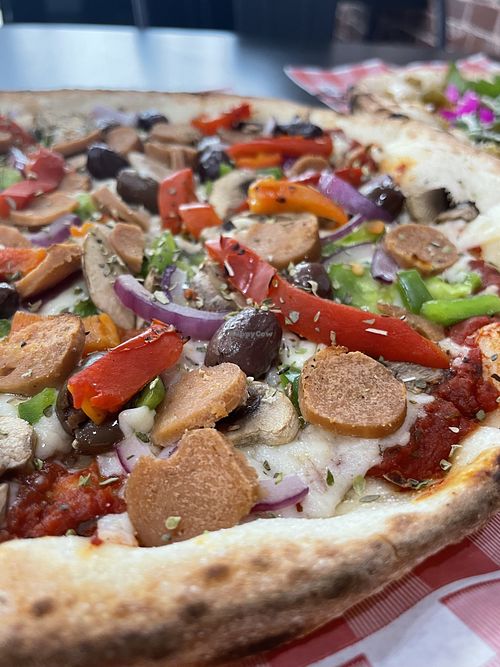 Vegan sausage and veg  at Slices Pizza in Burwood