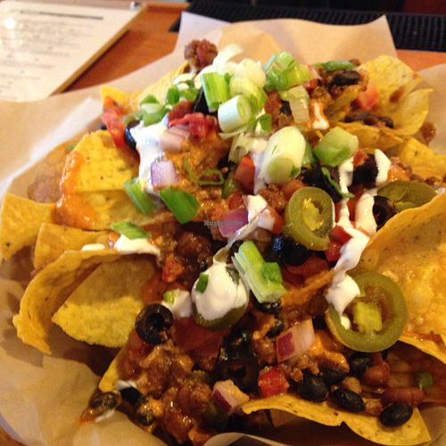 huge plate of nachos at Pig Minds Brewing in Machesney Park
