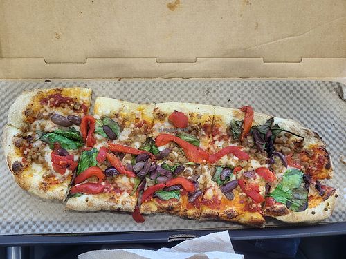 Fresh spinach, vegan sausage, kalamatas, and roasted red peppers. at DCA - &pizza - T2 in Arlington