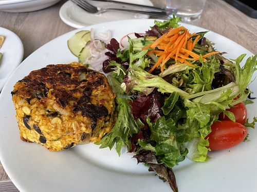 Veggie burger and salad. (Bun isn’t vegan)   at The Mustard Seed in Mount Pleasant