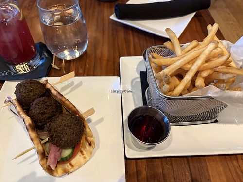 Vegan falafel sandwich and fries (prepared in a separate animal product-free fryer!)  at Rail Stop in Brighton
