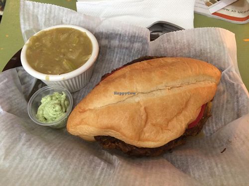 $10 special: dragon burger on a roll, side of spicy cabbage soup, vegan cilantro sauce, and iced teas at Mother Earth Sanctuary Cafe in Lake Worth