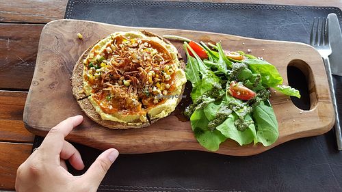 Raw pizza. Tasty (quite salty, if you like). at Vikasa Yoga Retreat and Restaurant in Koh Samui