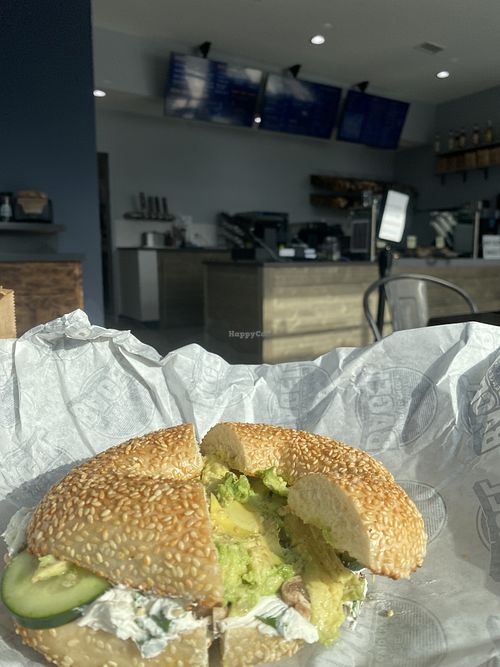 Sesame bagel with vegan chive cream cheese, avocado, cucumber, and mushrooms  at Providence Bagel in Attleboro