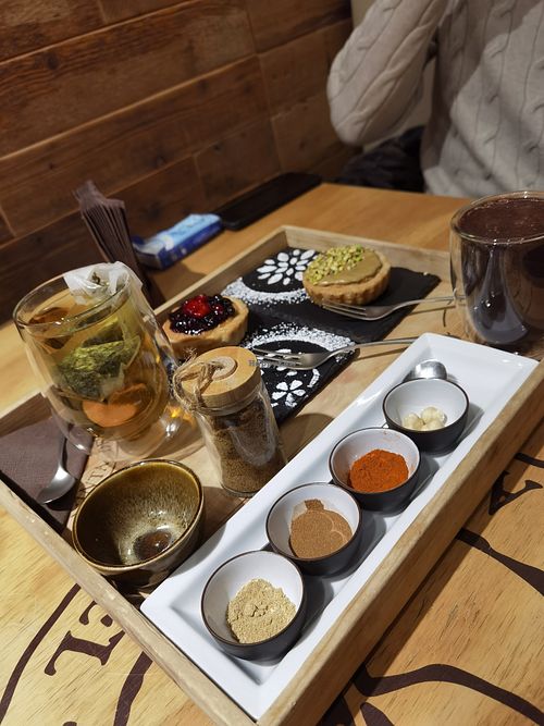 Hot chocolate, green tea and sweeties.  at Teaperugia in Perugia