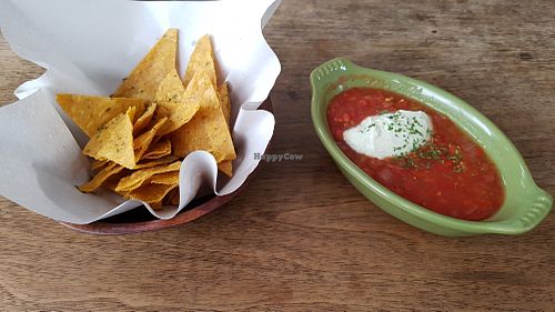Tortilla chips with chili sauce and cheese at Bonita Cafe and Social Club in Bangkok