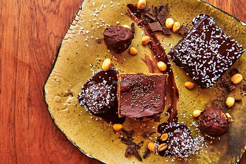 There are many different cakes in Norðurs cooling display including aquafaba desserts from Glean at Nordur in Aalborg