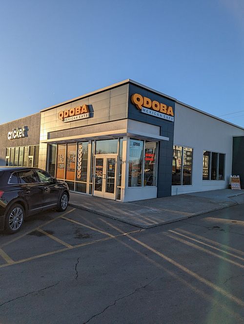 Corner of Broadway and 83rd, across from Taco Bell. at Qdoba in Minot