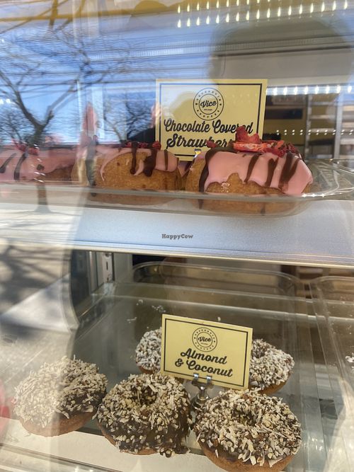 Vegan chocolate covered strawberry and almond coconut   at Vice Doughnuts & Coffee in Massapequa