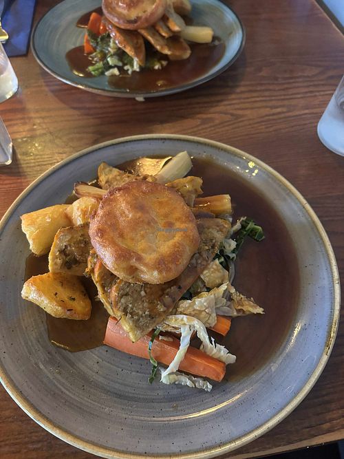 Vegan turkey and stuffing roast with a Yorkshire pudding, roast potatoes and veg, plenty of gravy and all super tasty. at The Commodore Inn in Grange-over-sands