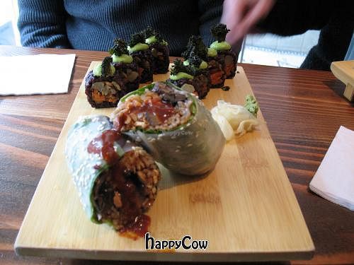 Roll of the Month - Black rice, lemon roasted Jerusalem artichokes and marinated carrots. Kale chip & sweet green pea-mint sauce.

Spicy Shroom Wrap at Beyond Sushi - Union Square in New York City