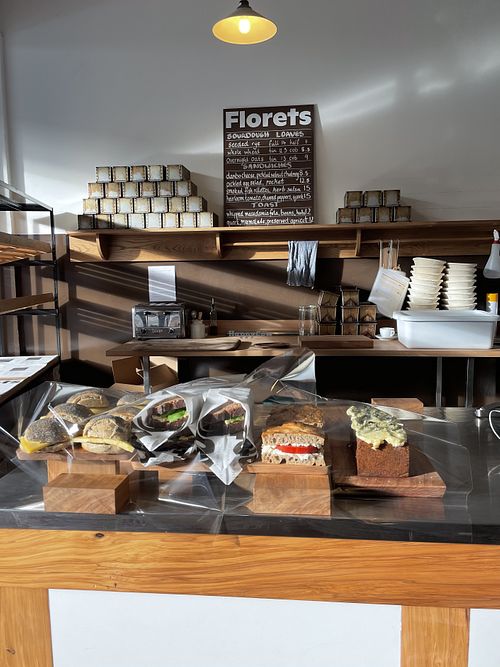 Menu changes seasonally. In this photo features the vegan Rosemary salt cookie and the vegan macadamia "feta" and tomato sandwich on the organic sourdough bread    at Florets in Auckland