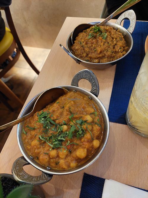 2 curries, both about 13 euros, come with rice at Chef Guru - Indian Cuisine  in Funchal