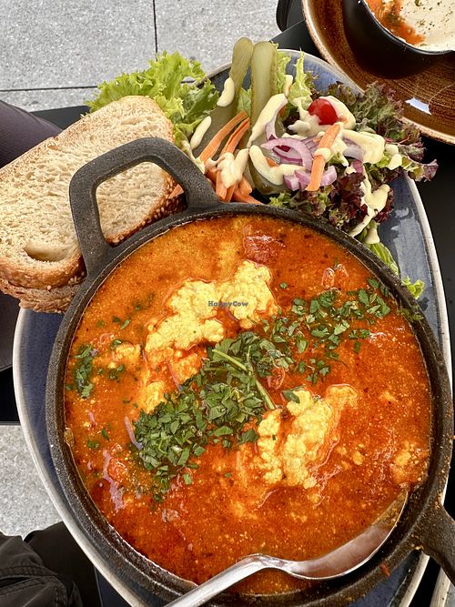 Breakfast egg dish made with tofu and grilled tomatoes  at Life Deli in Frankfurt