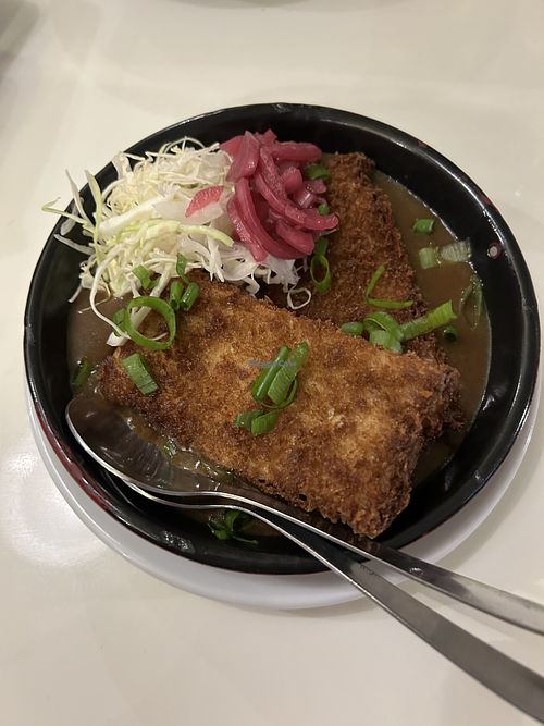 Breaded tofu curry  at Outra Espécie  in Porto