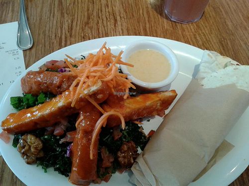 The All Hail Kale salad with Buffalo Chicken and Mini Mexi rolls. Very awesome at Veggie Grill by Next Level in Long Beach