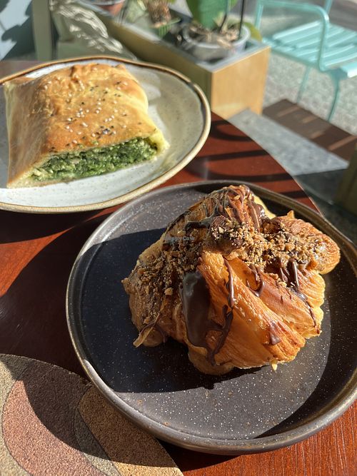 Spinach and ricotta roll; chocolate hazelnut croissant - both fantastic!   at A Padoca in Porto