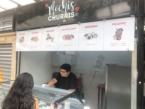 Menu board   at Mochis Churris in Santiago