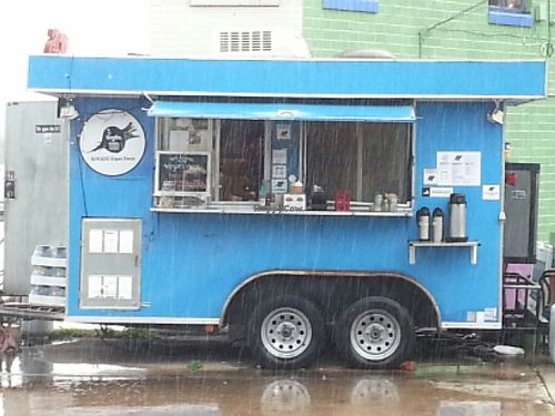 food in the rain at The Vegan Nom Food Truck - North Loop in Austin