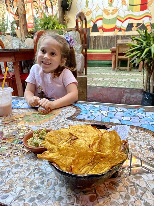 Patacones with guacamole   at Sativa Studio Cafe in Banos
