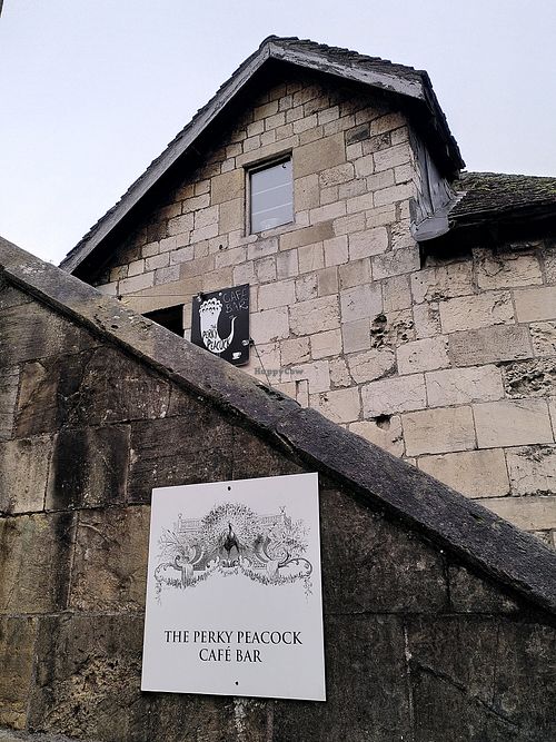 The outside - steps up to where you need to order (January 2023) at The Perky Peacock in York