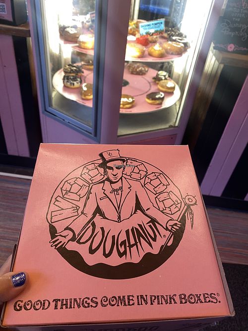 Famous Pink Box and Doughnut Display Case in Back  at Voodoo Doughnut in Portland