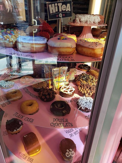 2 huge display cases at Voodoo Doughnut in Portland