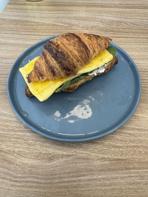 Croissant breakfast sandwich   at Feast & Fallow in Vancouver