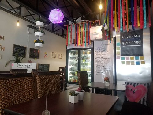 It is small but comfortable. at Be Raw Food and Juice in Dallas