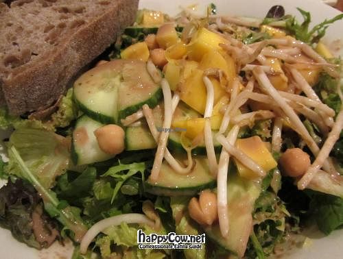 Salad with lettuce, cucumber, chickpeas, mango and sprouts at Dean & David - St Johanner Markt in Saarbrucken