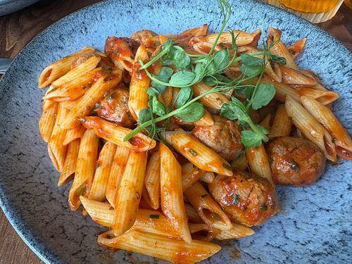 Tomato and basil pasta which they kindly added veggie meatballs to on my request. Made it a decent portion.  at Cafe Kisa in Auchterarder