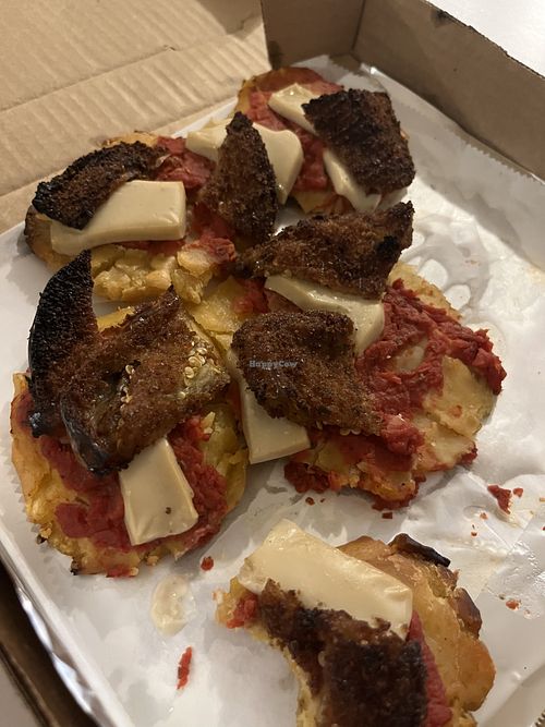   at Revolution Pizza Shop in Luquillo