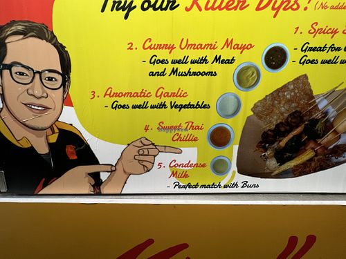 Remb to inform them of you are vegan and get only the Thai chili sauce   at Maxwell Lok Lok in Central Singapore