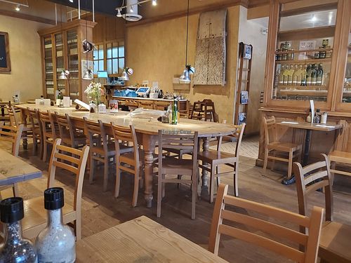Inside, communal table at Le Pain Quotidien - Robertson Blvd in Los Angeles