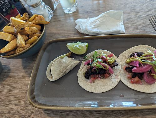 Portobello mushroom tacos and a side of chunky chips (*chips not confirmed vegan) at Three Trees in Swindon