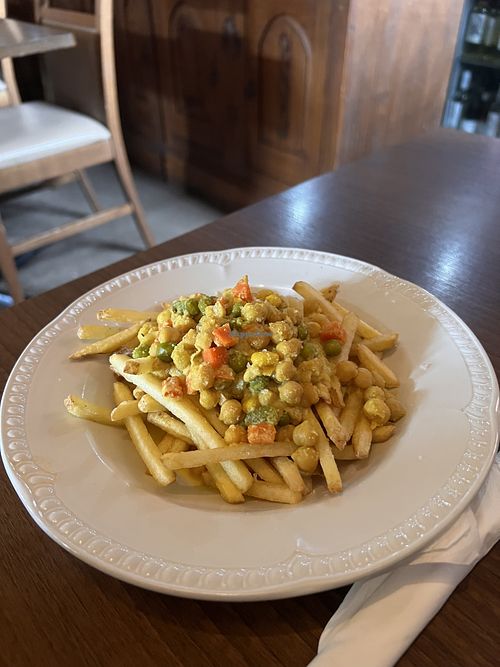 Loaded fries with creamy coconut curry   at Y Sospan in Dolgellau