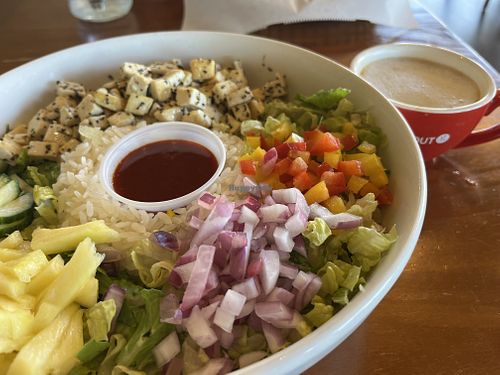 Tofu bibimbap and oat milk cappuccino   at All About Cha in Lubbock