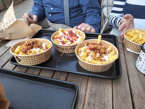 Garlic fries & other fries. at Swing Kitchen in Munich