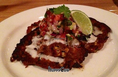 Corn Adzuki Bean Cakes (vegan) - organic brown rice, pico de gallo, avocado, cilantro, lime, vegan sour cream  at Om Cafe - Traverse City in Traverse City