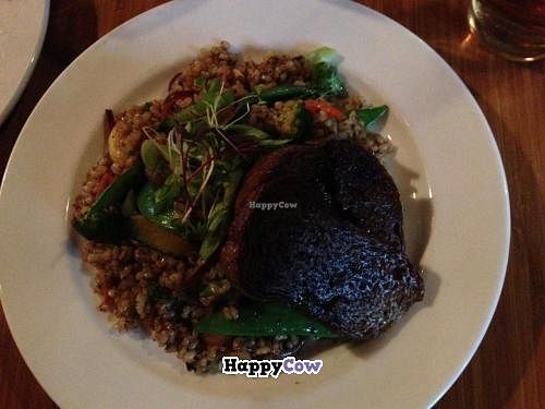 veggie stir-fry with seitan, over brown rice. at Om Cafe - Traverse City in Traverse City